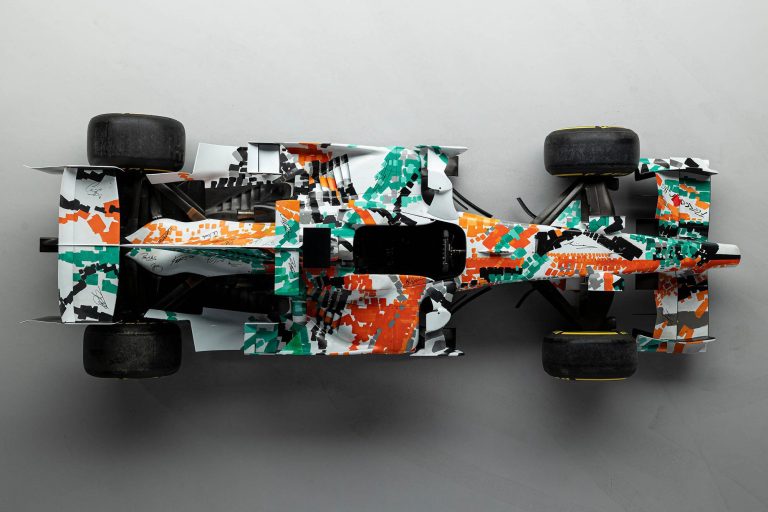 Rare Force India VJM01 F1 Art Car at Goodwood Festival The 2008 Force India VJM01 art car, featuring a green, white, and orange livery designed by Dexter Brown, on display at the Goodwood Festival of Speed.