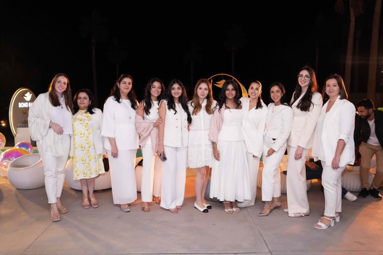 Dove Bond Repair Launches New Range for Damaged Hair at Dubai’s Nikki Beach A display of the Dove Bond Repair range, featuring shampoo, conditioner, mask, and serum, showcased at Nikki Beach, Dubai.