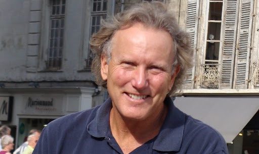 Ken Steinkamp: Journey of a Visionary Artist Across America A captivating piece of mixed media artwork by Ken Steinkamp, featuring vibrant colors and abstract forms that invite introspection and contemplation.